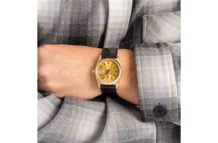 can you wind rolex backwards